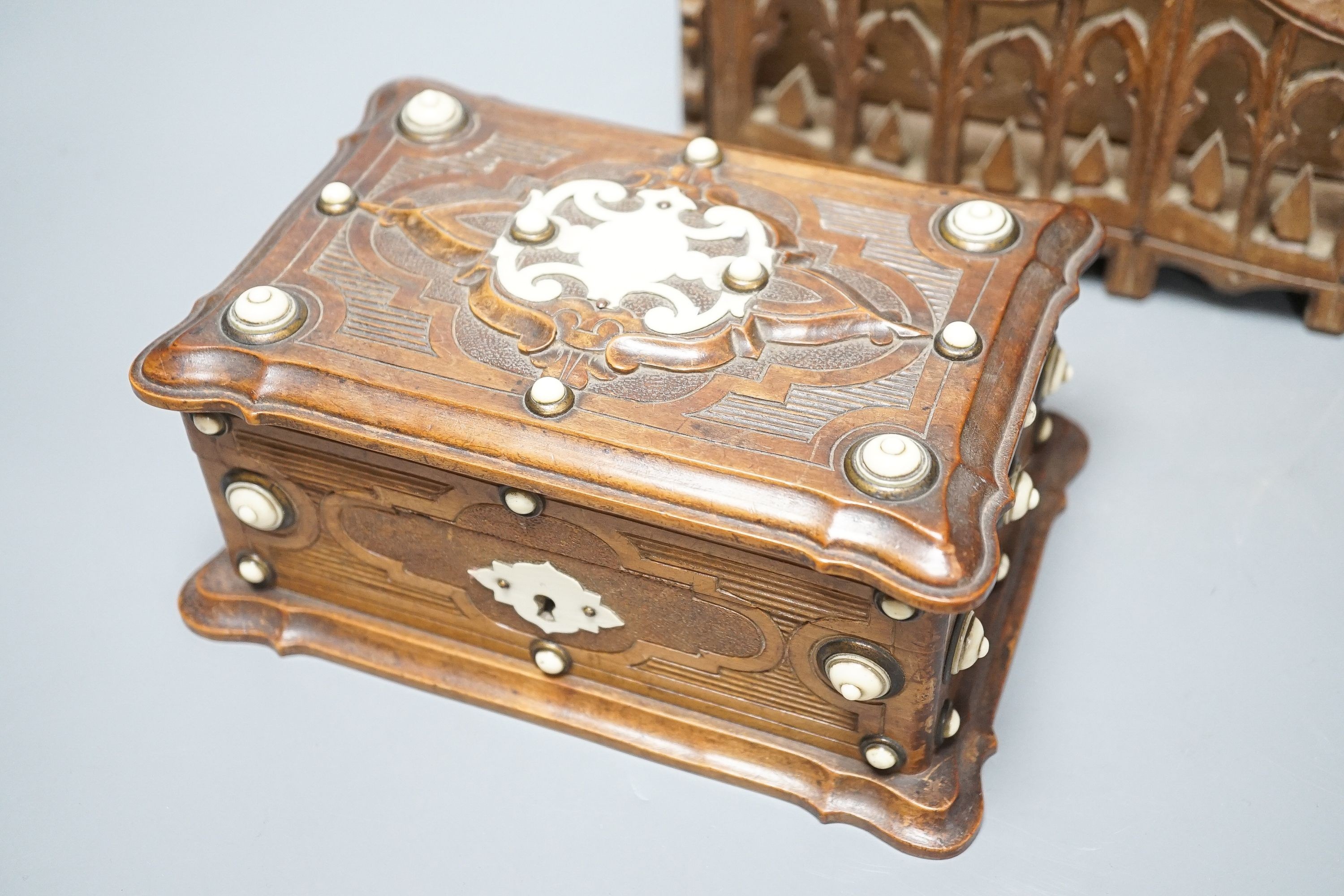 An Ivory mounted fruitwood box and a gothic style letter rack 25cm